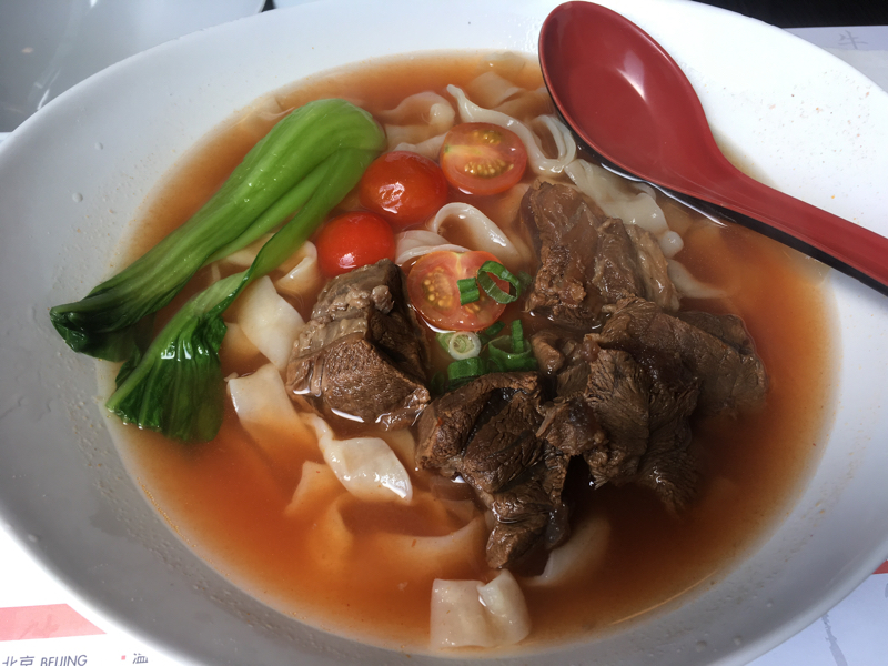 You should try the beef noodle, A1 or A3. They are not spicy, but good.